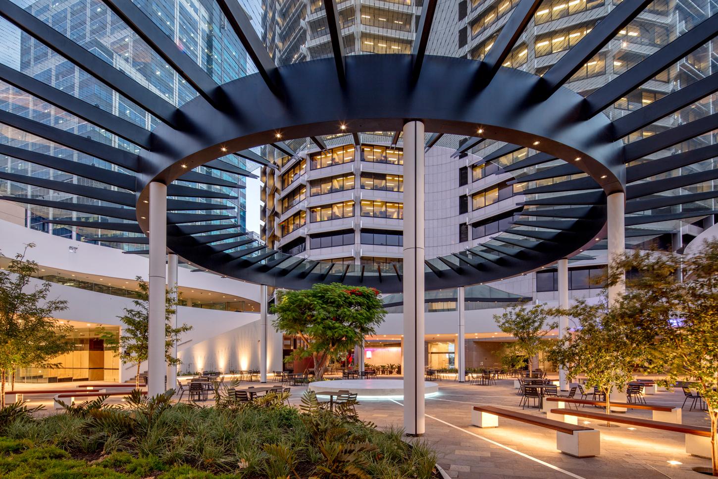 QV1 building with an architectural circular opening in the ceiling