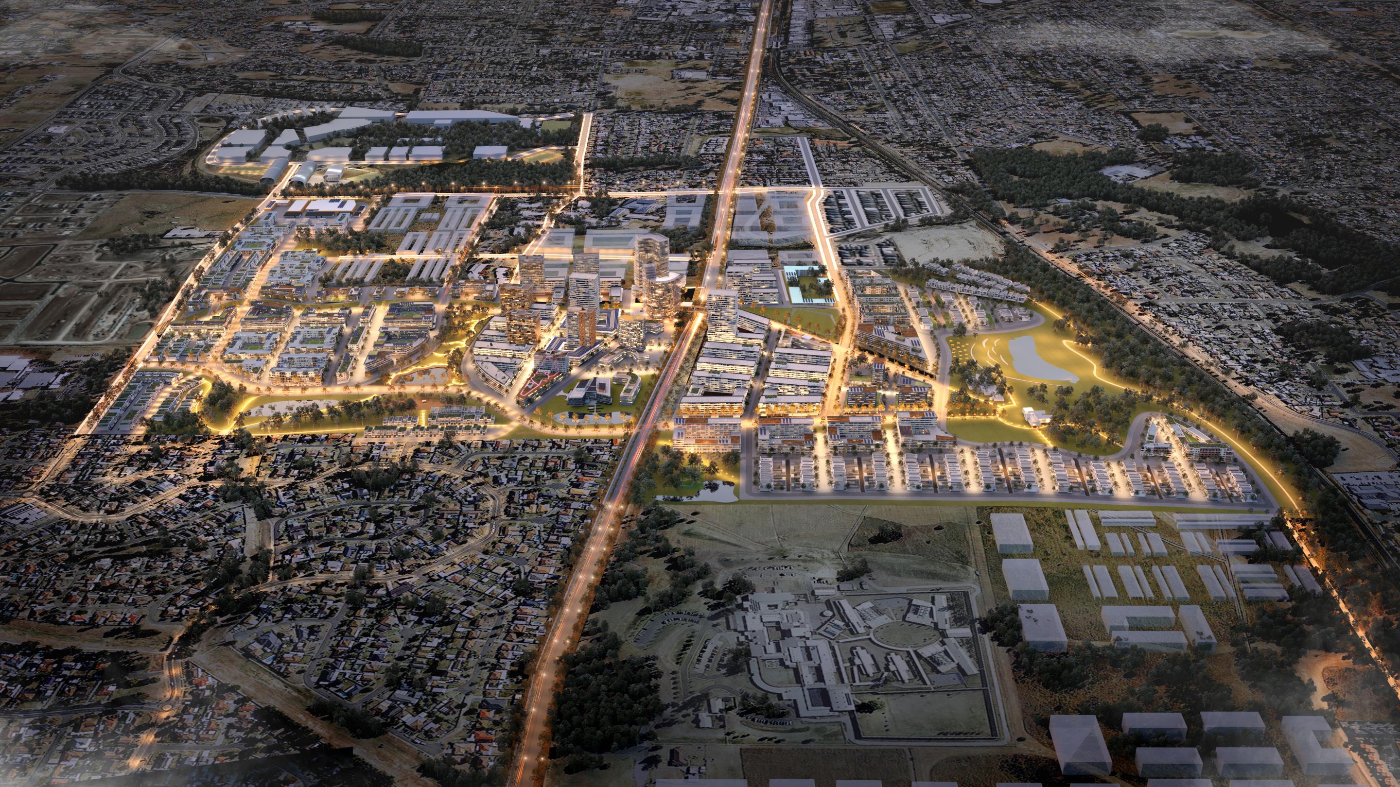 Overhead photograph of city suburb at dusk with lights turned on