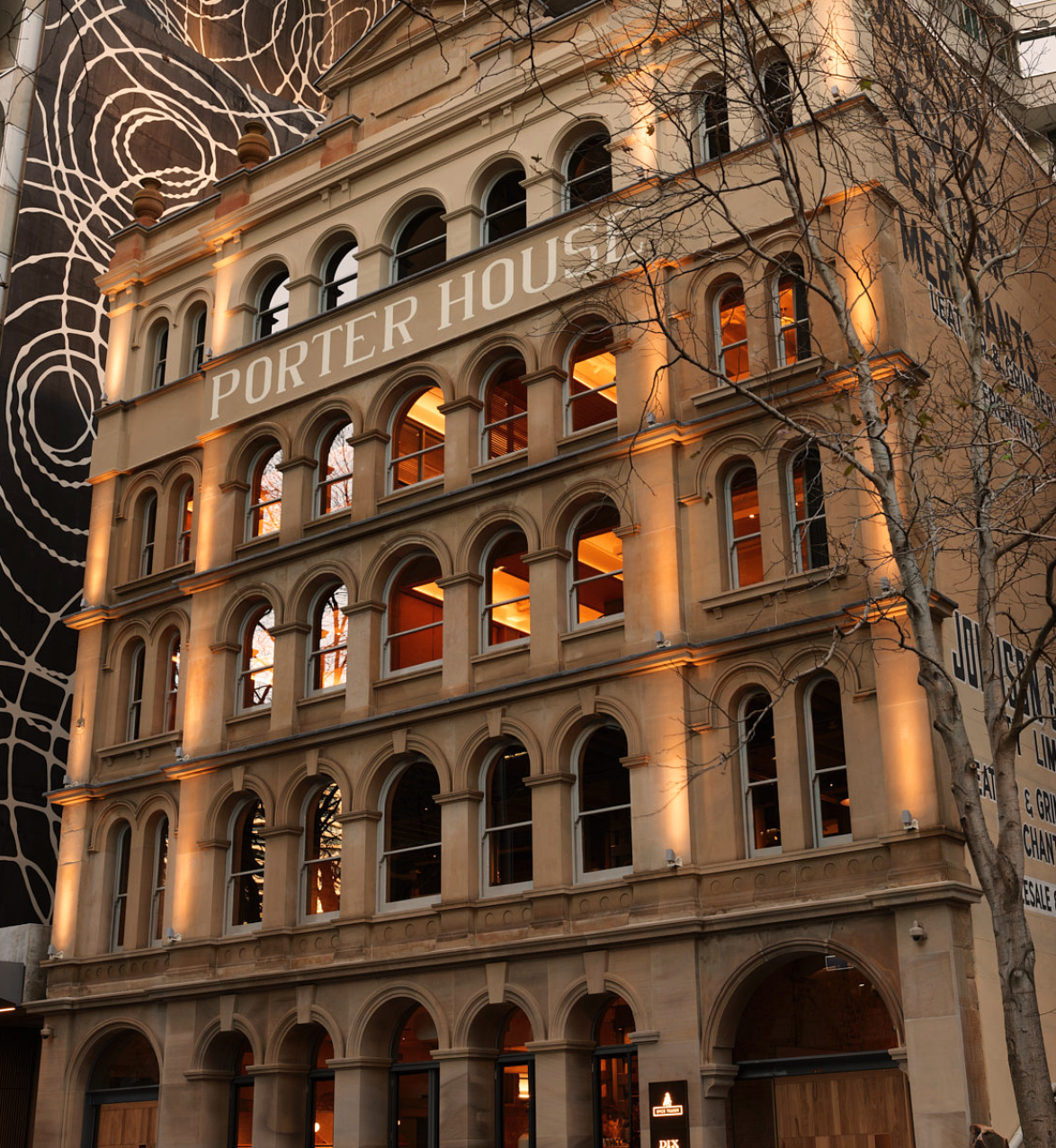 Exterior view of old stone building with Porter House written in gold letters on the front