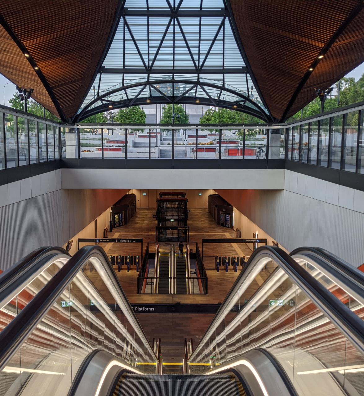 Inside Sydney Metro station in front of escalator