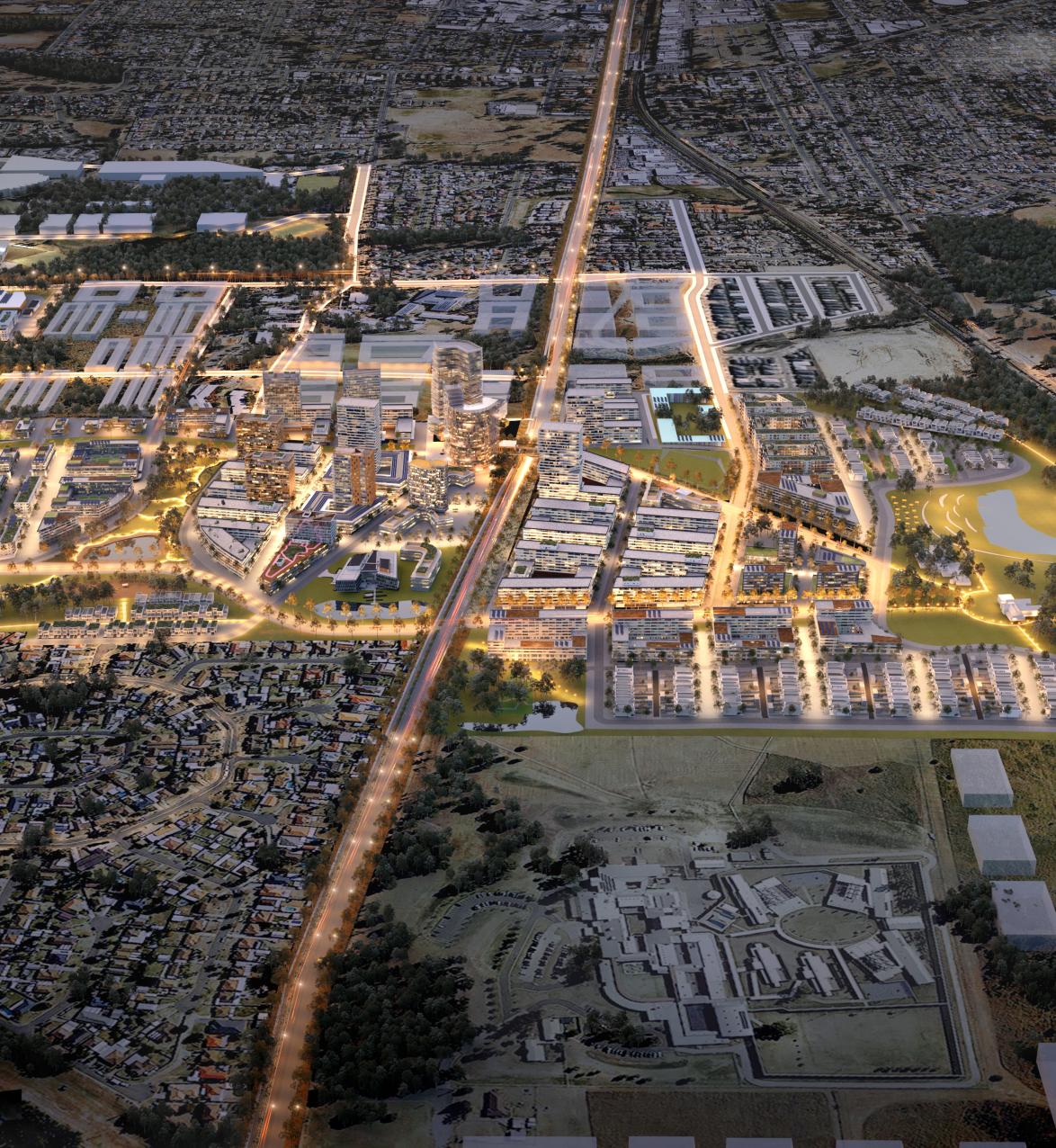 Overhead photograph of city suburb at dusk with lights turned on