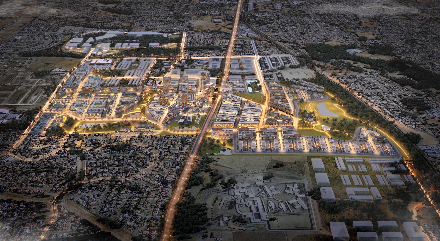 Overhead photograph of city suburb at dusk with lights turned on